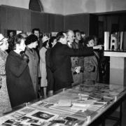 Dušan Moravec guiding visitors through the exhibition Shakespeare and Slovenians. The Slovenian Theatre Museum opened the exhibit in 1964, at the 400th anniversary of Shakespeare's birth, its venue was the Ljubljana City Galler y. Photo: Vlastja Simončič, source: Iconotheque SLOGI – Theatre Museum.